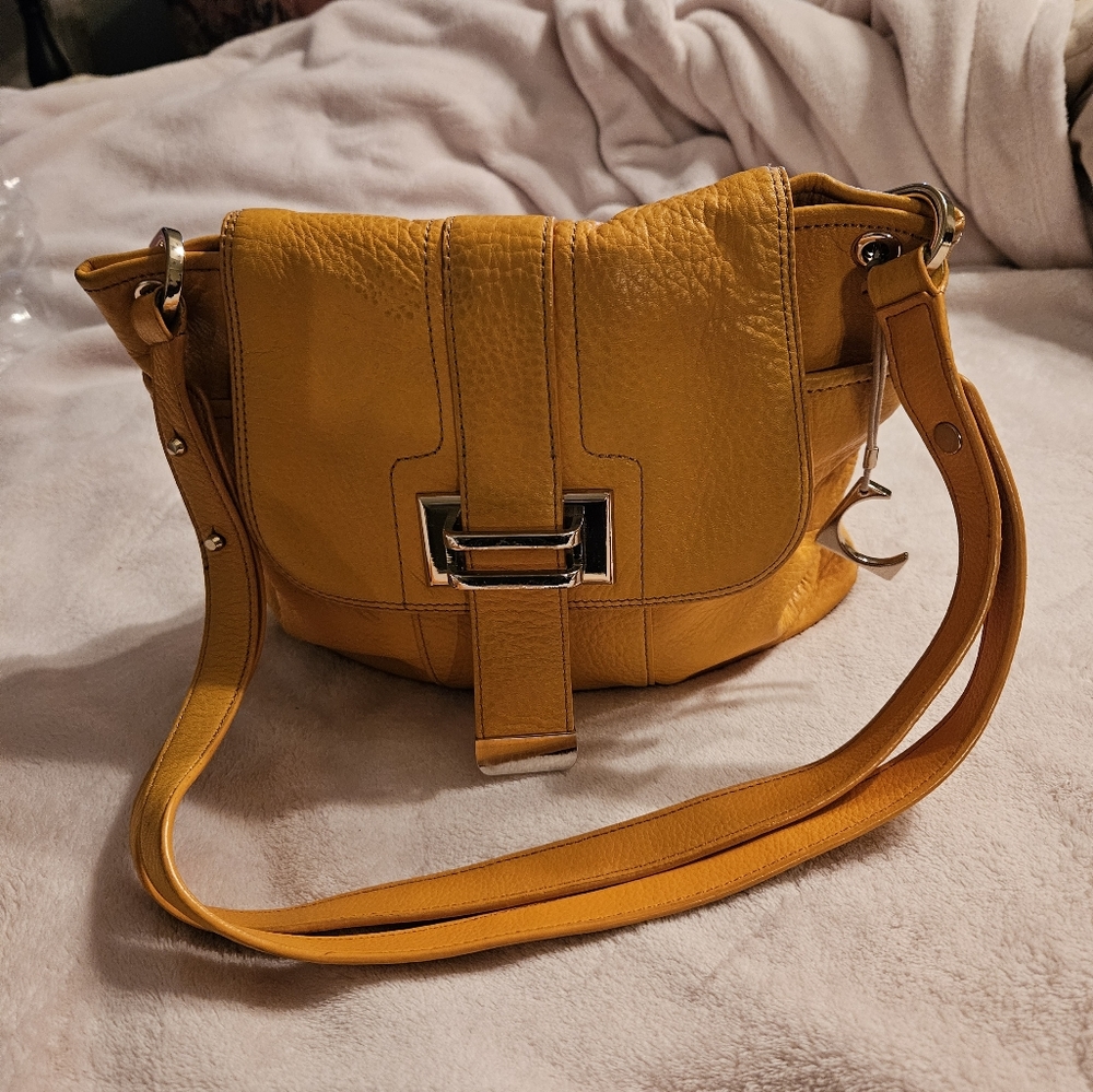 Yellow on shoulder bag
